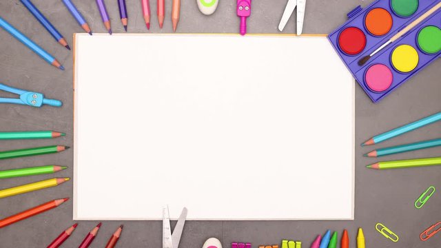 School supplies moving up and down around the drawing block leaving empty space for your text - Stop motion 