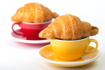 yellow and red cup on a white background