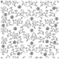Cute seamless pattern birds on branches.