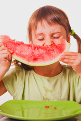 Funny image of beautiful happy young woman eating watermelon. Vitamins, nutritional vegetarian food, holiday, diet concept.