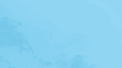 Light pale blue sky background. 16:9 panoramic format