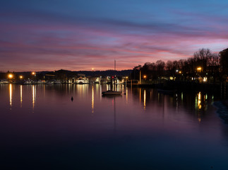 beautiful sunset with a burning sky on lake Maggiore.Arona - Italy