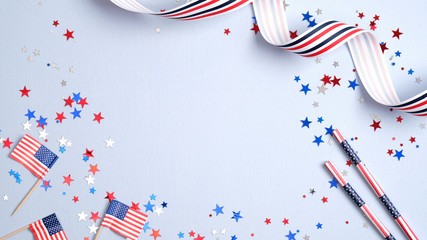 Independence day USA banner mockup with American flags, drinking straws, confetti and ribbon. USA...