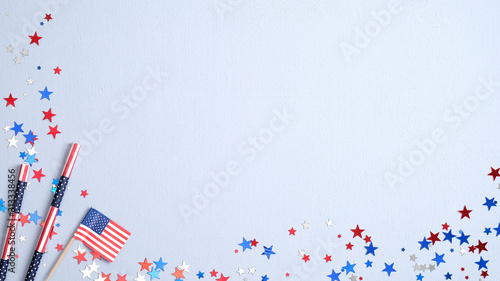 Happy Presidents Day banner with American flag, drinking straws and confetti on blue background. USA Independence Day, American Labor day, Memorial Day, US election concept.