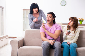 Young family and mother-in-law in family issues concept