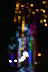 Bokeh of colorful lights in the garden at night