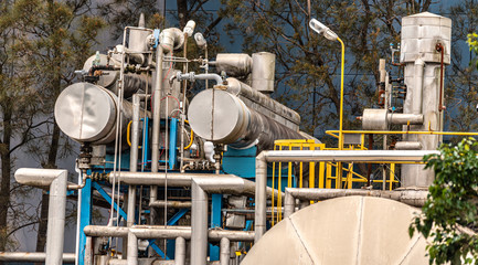 industrial plant and Steel pipelines to its storage distillery tanks