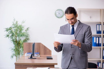 Unhappy male businessman in the office