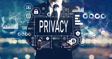Privacy concept with businessman holding a tablet computer