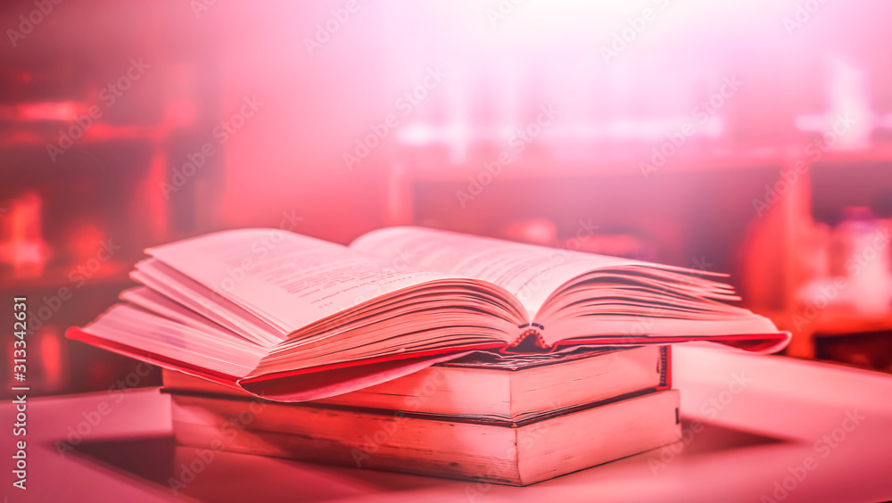 Poster stack of books in the library and blur bookshelf background