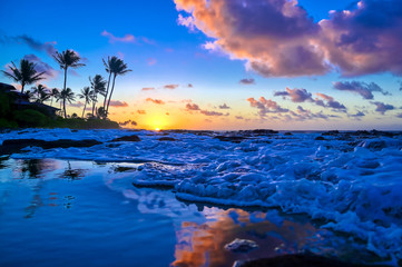 Fototapeta na wymiar Sunrise over the coast of Kauai, Hawaii,