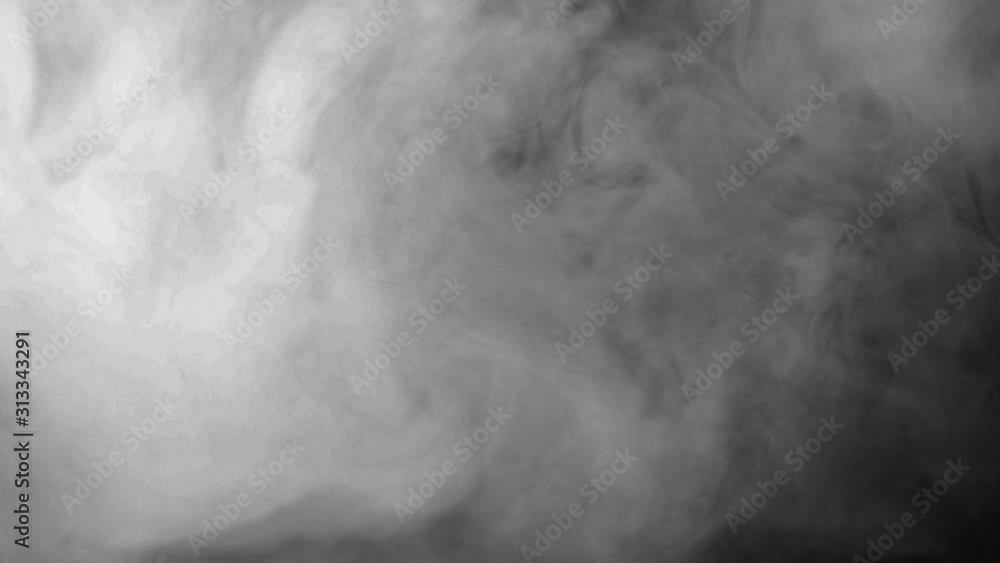 Wall mural white smoke on a black background. start the cloud moving from the top to the bottom quickly. the co