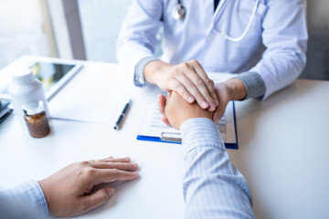 Doctor giving medical consultation diagnostic,Medical physician working in hospital, Healthcare concept.