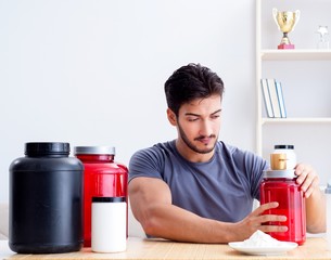 Athlete tasting new protein supplements for better muscles