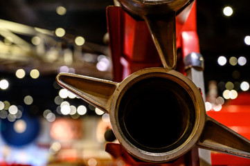 Open end view of a 2 1/2 inch ridged fire hose on the back of an engine truck