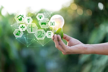 Foto op Canvas Hand holding light bulb with icons energy sources for renewable,love the world concept. © A Stockphoto
