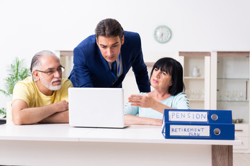 Financial advisor giving retirement advice to old couple