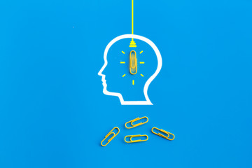 Great ideas concept with human brain, paperclip,thinking,creativity,light bulb on blue background,new ideas concept