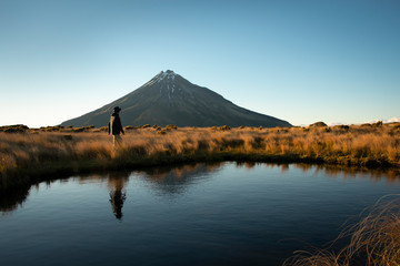 Looking up at Mt Taranaki from Pouakai tarn in Egmont National Park