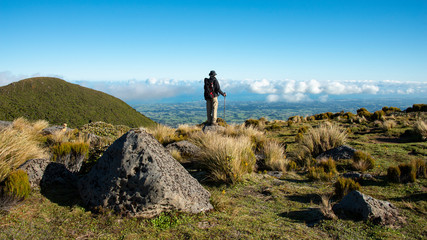 Obraz premium Hiking Pouakai circuit taking in stunning views of the Taranaki coastline