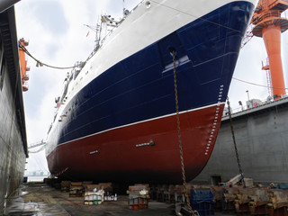 Fototapeta na wymiar Fishing ship in the dock for repair 