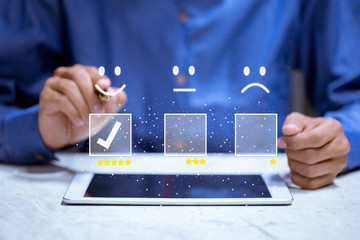 Business customer pressing smiley face emoticon online, Service rating, satisfaction concept.