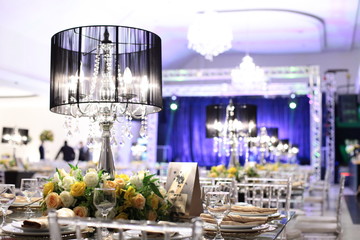 Table setting with glasses, plates, napkins and food