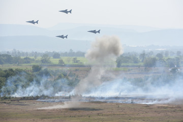 Many fighters train to fly above the sky and fly.