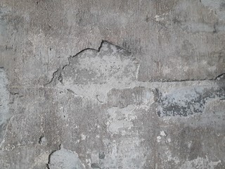 Gray cement wall Broken wall Due to lack of standards causing cracks