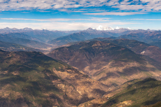 Topview of Bhutan, See himalaya mountains on airplane.