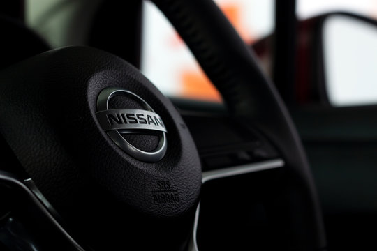 CHIANG RAI, THAILAND-DECEMBER 20, 2018, closeup steering wheel of all new nissan almera car with soft-focus and over light in the background