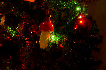 Christmas toys and garlands on a Christmas tree