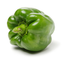 fresh green bell pepper (capsicum) on a white background