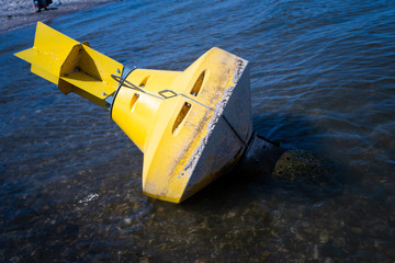 Warning buoy at the river. drought concept