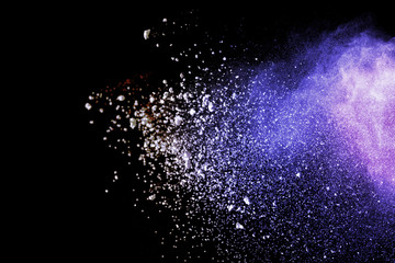 Fototapeta na wymiar Colorful powder explosion on black background. 