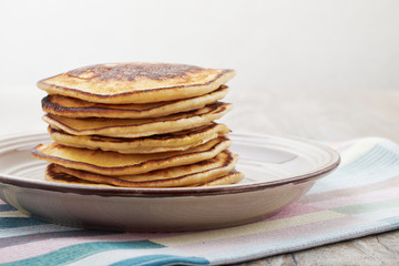 Pancakes with bananas almond and caramel sauce. selective focus.