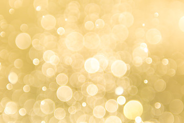 Gold background with light bokeh. Abstrat background