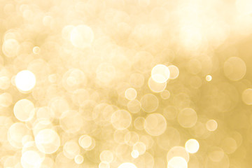Gold background with light bokeh. Abstrat background - obrazy, fototapety, plakaty