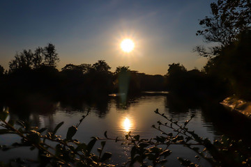 Sunset over a lake in Yangon, Myanmar