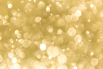 abstract gold background with soft blur bokeh light effect, background bokeh