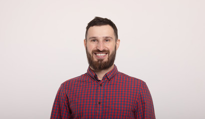 Fototapeta premium Portrait of cheerful smiling bearded man.