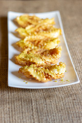 sweet chatter with honey syrup in a white dish