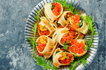 Red caviar stuffed pasta