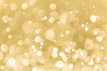 abstract gold background with soft blur bokeh light effect, background bokeh