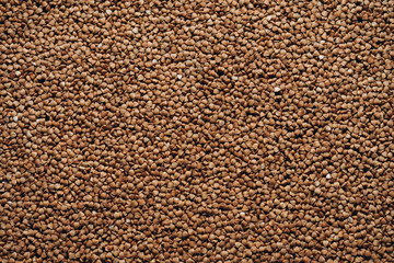 natural buckwheat grain background. texture background
