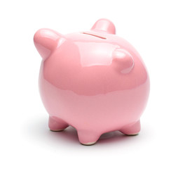 Pink piggy bank isolated on a white background