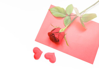 Red rose, love letter and mini red heart on white background, sweet valentine background