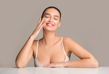Happy woman with collagen pads under eyes - obrazy, fototapety, plakaty