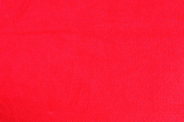 The texture of the red cloth.
