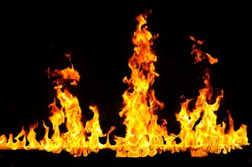 Fire tongues on black background